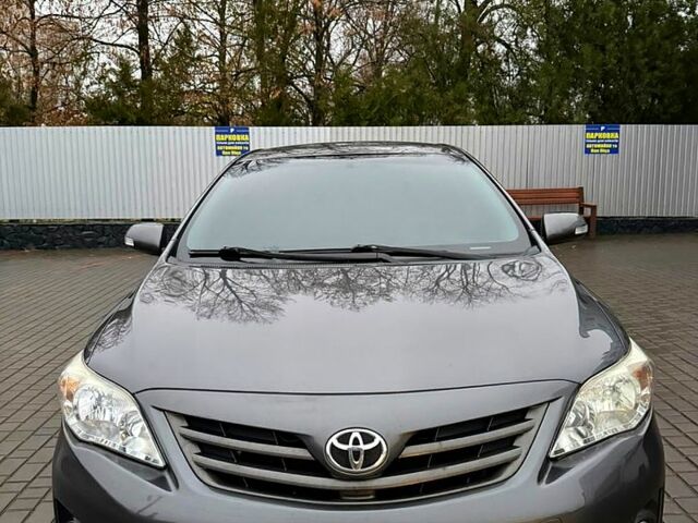 Сірий Тойота Королла, об'ємом двигуна 1.6 л та пробігом 168 тис. км за 11600 $, фото 1 на Automoto.ua
