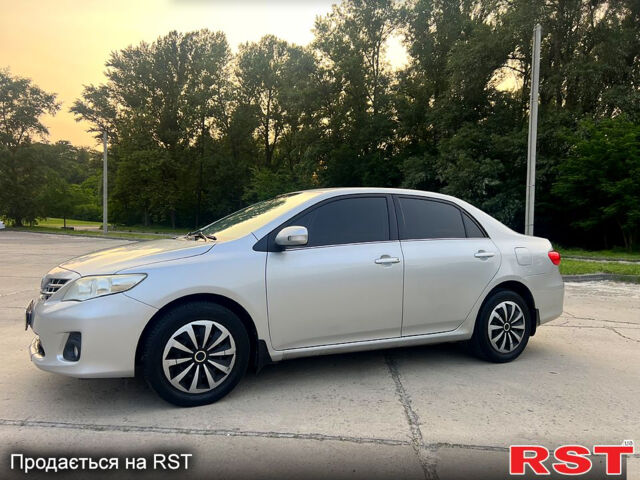 Сірий Тойота Королла, об'ємом двигуна 1.6 л та пробігом 234 тис. км за 9200 $, фото 1 на Automoto.ua