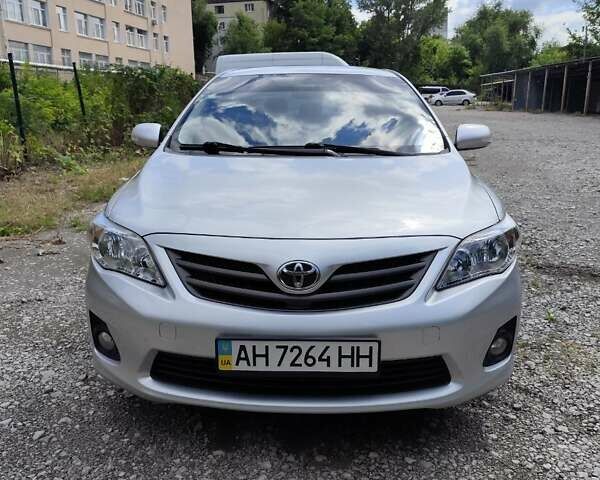 Серый Тойота Королла, объемом двигателя 1.33 л и пробегом 223 тыс. км за 7800 $, фото 1 на Automoto.ua
