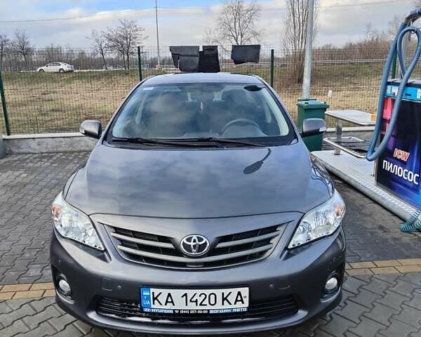 Сірий Тойота Королла, об'ємом двигуна 1.33 л та пробігом 139 тис. км за 8800 $, фото 1 на Automoto.ua