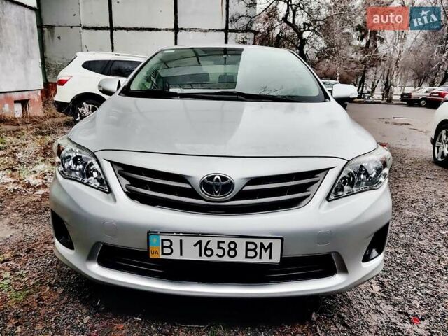 Сірий Тойота Королла, об'ємом двигуна 1.33 л та пробігом 114 тис. км за 10500 $, фото 1 на Automoto.ua