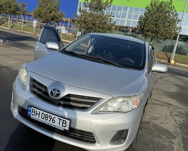 Сірий Тойота Королла, об'ємом двигуна 1.33 л та пробігом 134 тис. км за 9200 $, фото 1 на Automoto.ua