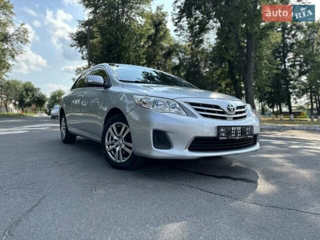 Сірий Тойота Королла, об'ємом двигуна 1.6 л та пробігом 120 тис. км за 8999 $, фото 1 на Automoto.ua