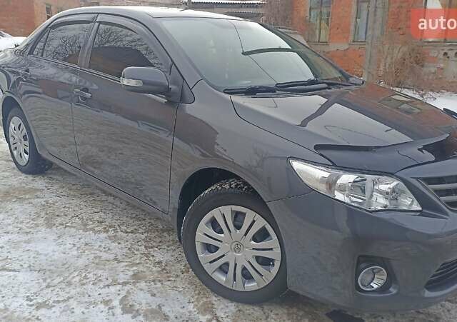 Серый Тойота Королла, объемом двигателя 1.6 л и пробегом 91 тыс. км за 10200 $, фото 1 на Automoto.ua