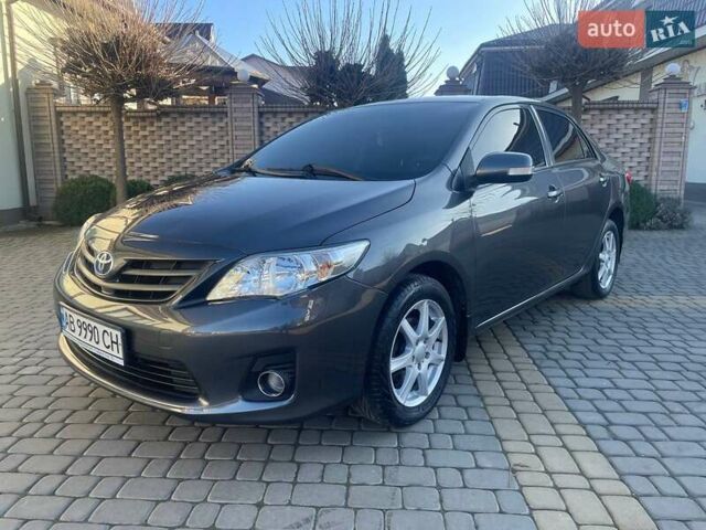 Сірий Тойота Королла, об'ємом двигуна 1.6 л та пробігом 180 тис. км за 10299 $, фото 1 на Automoto.ua