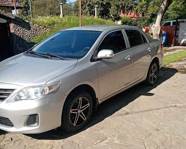 Сірий Тойота Королла, об'ємом двигуна 1.33 л та пробігом 220 тис. км за 7300 $, фото 1 на Automoto.ua