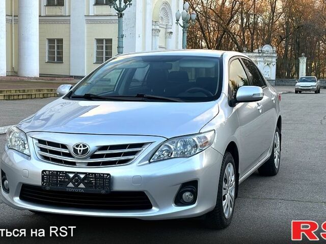 Сірий Тойота Королла, об'ємом двигуна 1.6 л та пробігом 63 тис. км за 10800 $, фото 1 на Automoto.ua