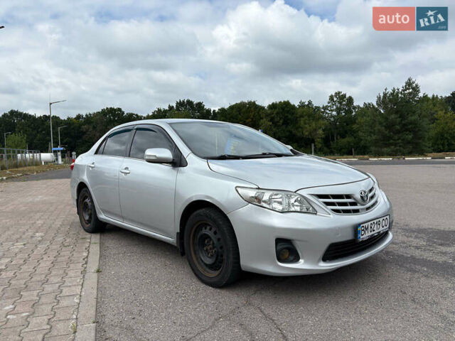 Сірий Тойота Королла, об'ємом двигуна 1.6 л та пробігом 191 тис. км за 7999 $, фото 1 на Automoto.ua