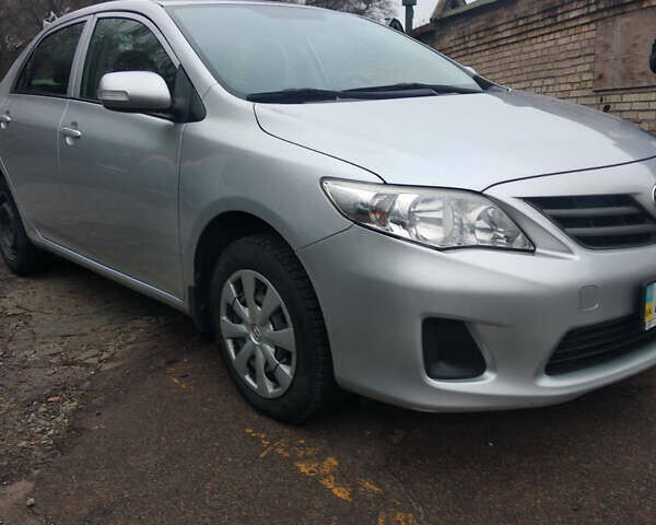 Серый Тойота Королла, объемом двигателя 1.33 л и пробегом 135 тыс. км за 7600 $, фото 1 на Automoto.ua