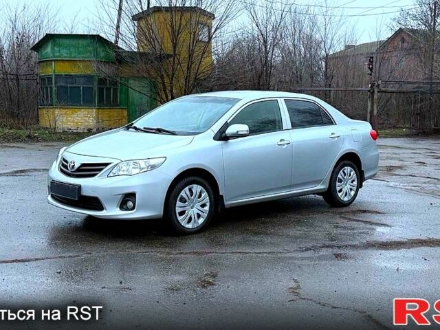 Сірий Тойота Королла, об'ємом двигуна 1.6 л та пробігом 61 тис. км за 11800 $, фото 1 на Automoto.ua