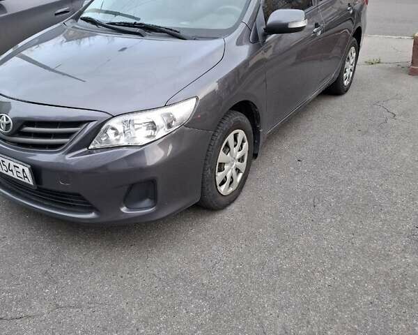 Серый Тойота Королла, объемом двигателя 1.3 л и пробегом 100 тыс. км за 8900 $, фото 1 на Automoto.ua
