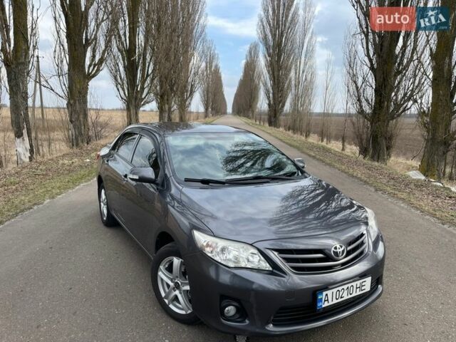 Серый Тойота Королла, объемом двигателя 1.6 л и пробегом 165 тыс. км за 9300 $, фото 1 на Automoto.ua