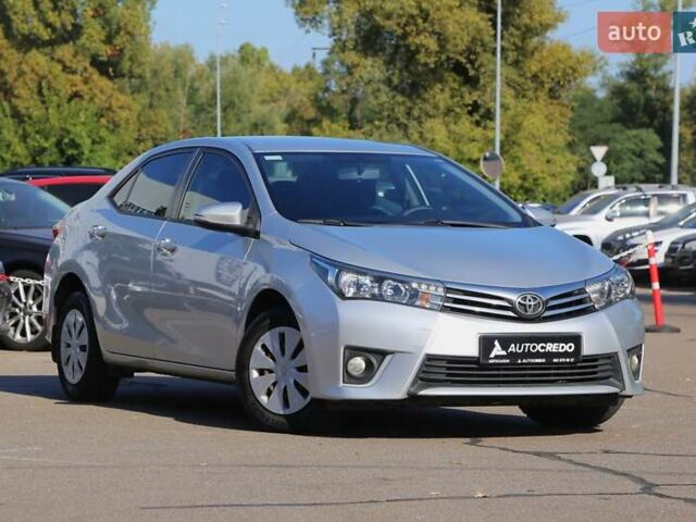 Серый Тойота Королла, объемом двигателя 1.6 л и пробегом 233 тыс. км за 12500 $, фото 1 на Automoto.ua