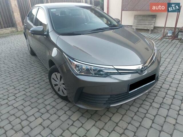 Сірий Тойота Королла, об'ємом двигуна 1.6 л та пробігом 112 тис. км за 13900 $, фото 1 на Automoto.ua