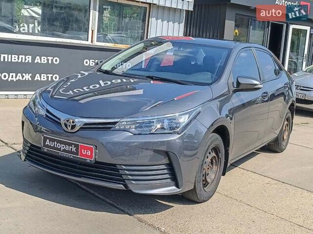 Сірий Тойота Королла, об'ємом двигуна 1.3 л та пробігом 124 тис. км за 10990 $, фото 1 на Automoto.ua