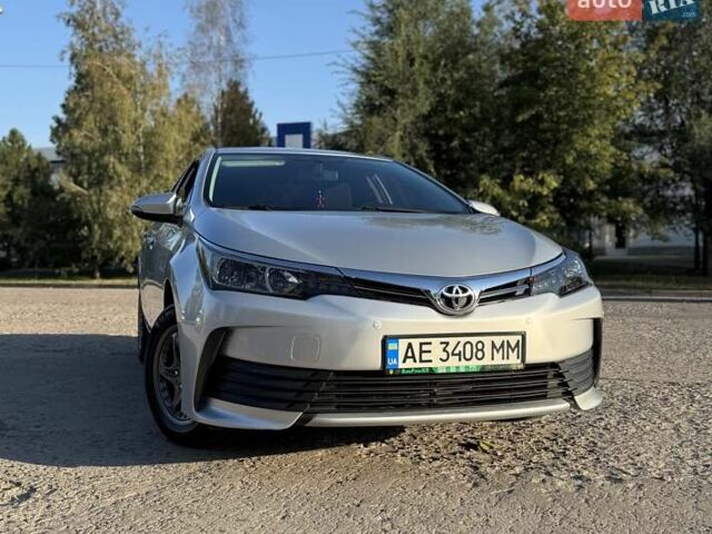Сірий Тойота Королла, об'ємом двигуна 1.33 л та пробігом 94 тис. км за 12500 $, фото 1 на Automoto.ua