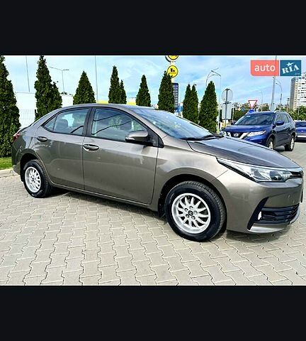 Серый Тойота Королла, объемом двигателя 16 л и пробегом 260 тыс. км за 11850 $, фото 1 на Automoto.ua