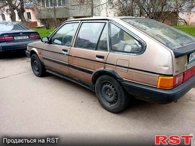 Серый Тойота Королла, объемом двигателя 1.3 л и пробегом 400 тыс. км за 500 $, фото 1 на Automoto.ua