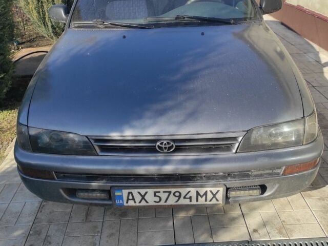 Сірий Тойота Королла, об'ємом двигуна 2 л та пробігом 370 тис. км за 1919 $, фото 1 на Automoto.ua