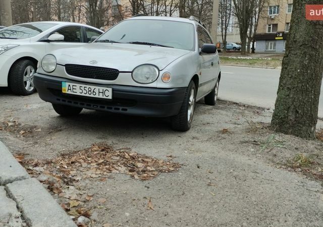 Серый Тойота Королла, объемом двигателя 1.33 л и пробегом 295 тыс. км за 2999 $, фото 1 на Automoto.ua