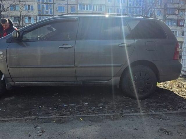 Сірий Тойота Королла, об'ємом двигуна 2 л та пробігом 269 тис. км за 1500 $, фото 1 на Automoto.ua