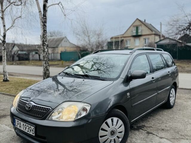 Серый Тойота Королла, объемом двигателя 2 л и пробегом 245 тыс. км за 2200 $, фото 1 на Automoto.ua