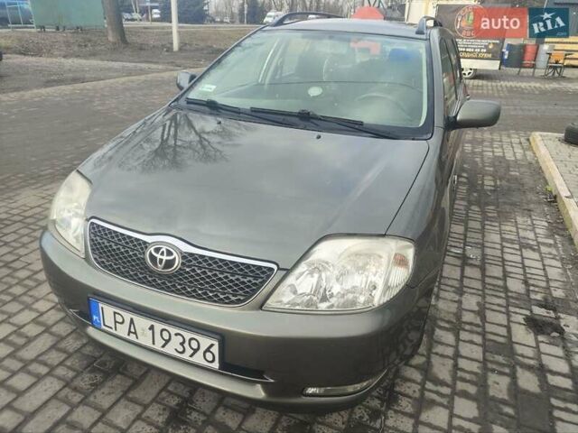 Серый Тойота Королла, объемом двигателя 2 л и пробегом 270 тыс. км за 2000 $, фото 1 на Automoto.ua
