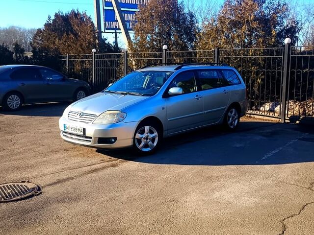 Серый Тойота Королла, объемом двигателя 2 л и пробегом 195 тыс. км за 5000 $, фото 1 на Automoto.ua