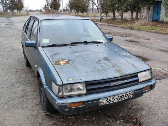 Серый Тойота Королла, объемом двигателя 1.3 л и пробегом 300 тыс. км за 238 $, фото 1 на Automoto.ua