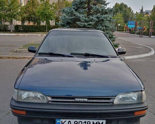 Синий Тойота Королла, объемом двигателя 1.3 л и пробегом 303 тыс. км за 2000 $, фото 1 на Automoto.ua