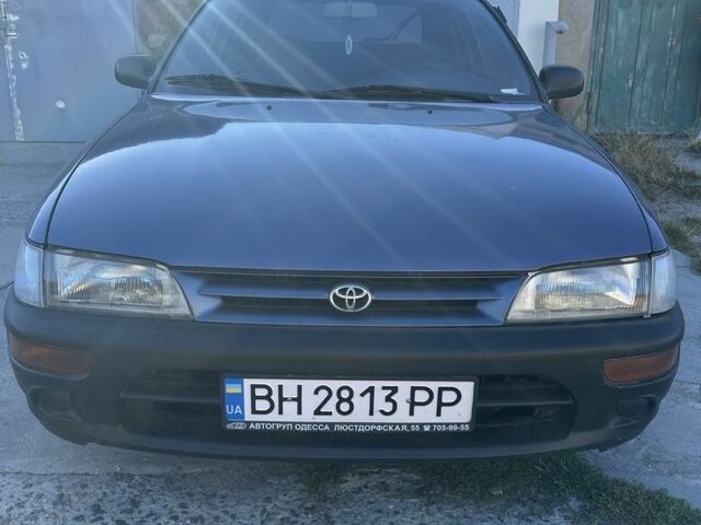 Синій Тойота Королла, об'ємом двигуна 1.3 л та пробігом 240 тис. км за 1400 $, фото 1 на Automoto.ua