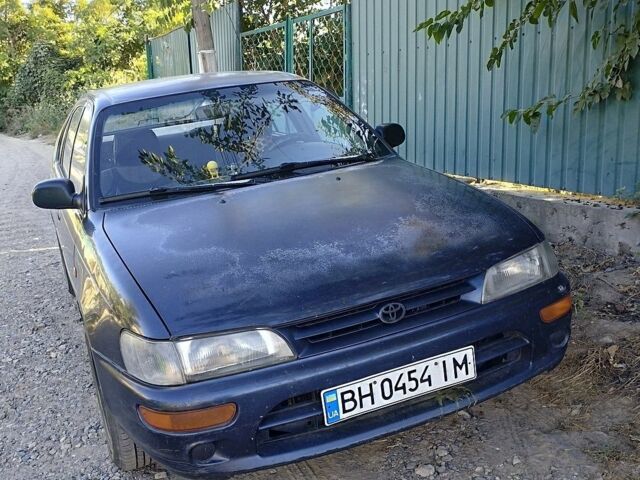 Синий Тойота Королла, объемом двигателя 1.3 л и пробегом 220 тыс. км за 1500 $, фото 1 на Automoto.ua