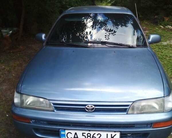 Синий Тойота Королла, объемом двигателя 1.3 л и пробегом 280 тыс. км за 2400 $, фото 1 на Automoto.ua