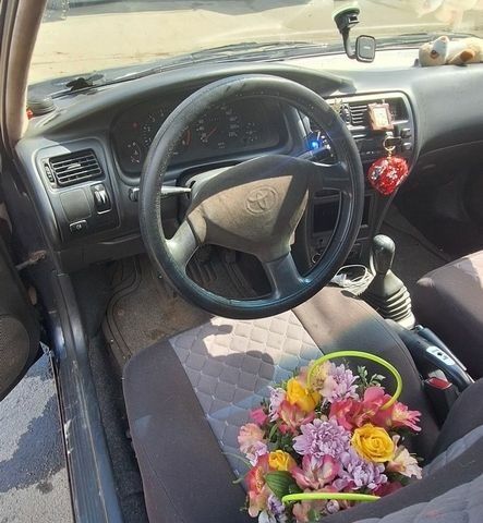 Синий Тойота Королла, объемом двигателя 1.33 л и пробегом 100 тыс. км за 1500 $, фото 1 на Automoto.ua