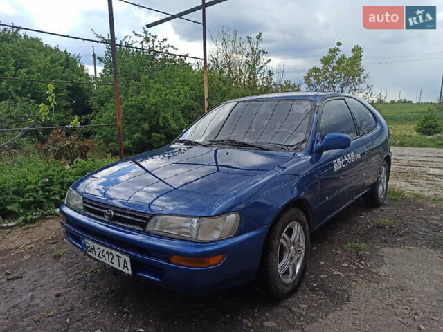 Синій Тойота Королла, об'ємом двигуна 1.3 л та пробігом 208 тис. км за 2799 $, фото 1 на Automoto.ua