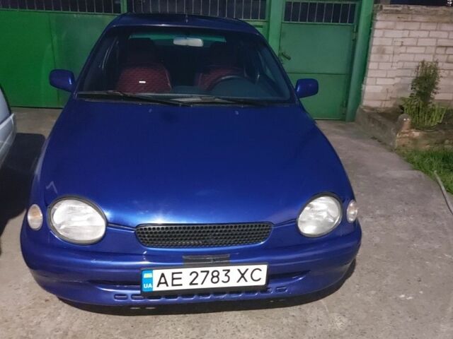 Синий Тойота Королла, объемом двигателя 1.3 л и пробегом 230 тыс. км за 1450 $, фото 1 на Automoto.ua