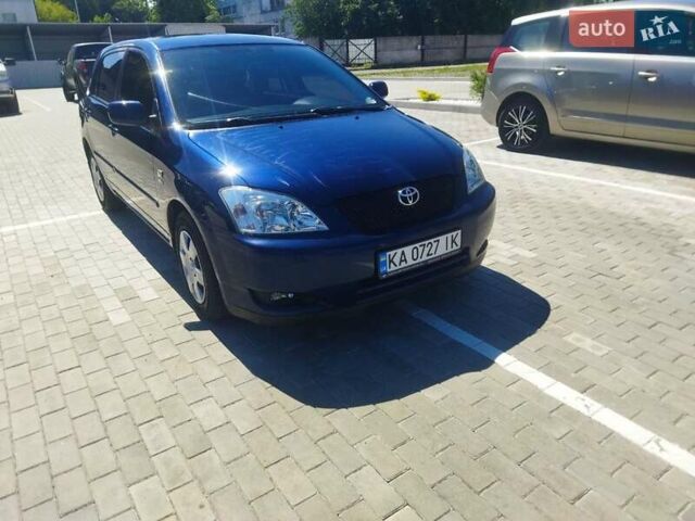 Синій Тойота Королла, об'ємом двигуна 1.4 л та пробігом 122 тис. км за 5999 $, фото 1 на Automoto.ua