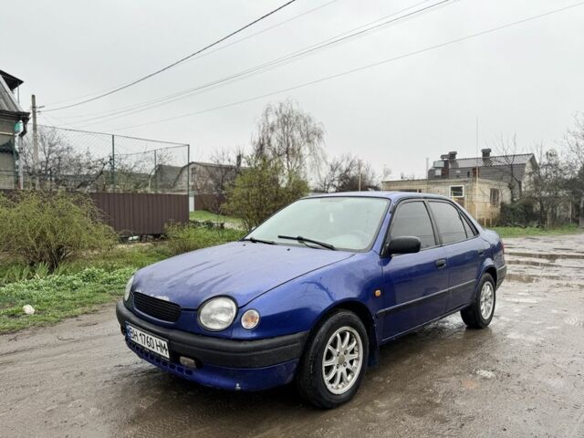 Синий Тойота Королла, объемом двигателя 1.3 л и пробегом 80 тыс. км за 1400 $, фото 1 на Automoto.ua