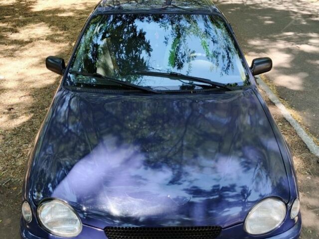 Синій Тойота Королла, об'ємом двигуна 1.3 л та пробігом 324 тис. км за 2300 $, фото 1 на Automoto.ua