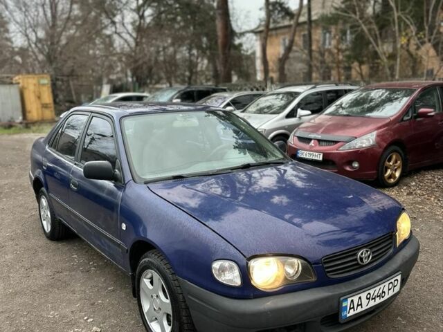 Синий Тойота Королла, объемом двигателя 1.4 л и пробегом 300 тыс. км за 1999 $, фото 1 на Automoto.ua