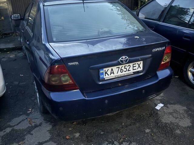 Синий Тойота Королла, объемом двигателя 1.4 л и пробегом 250 тыс. км за 1200 $, фото 1 на Automoto.ua