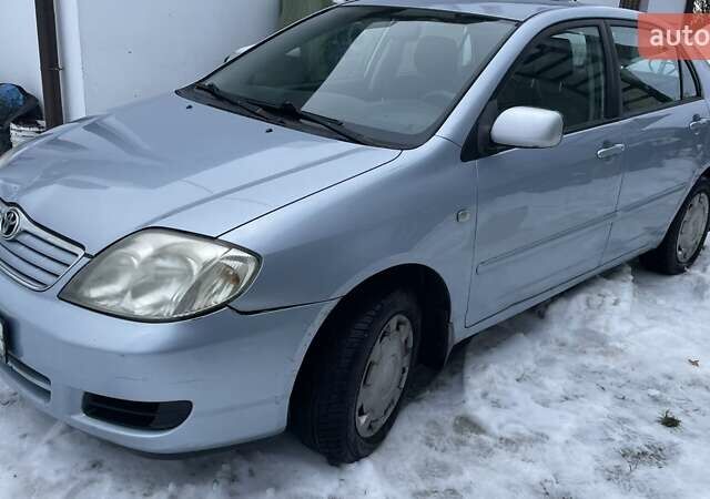 Синий Тойота Королла, объемом двигателя 1.6 л и пробегом 250 тыс. км за 3200 $, фото 1 на Automoto.ua