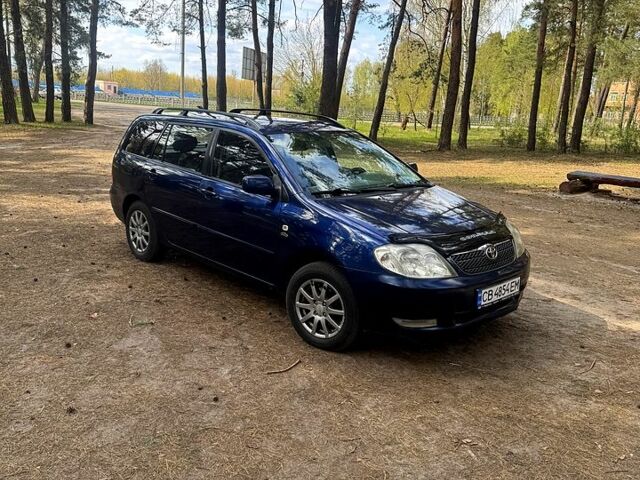 Синий Тойота Королла, объемом двигателя 2 л и пробегом 304 тыс. км за 3900 $, фото 1 на Automoto.ua