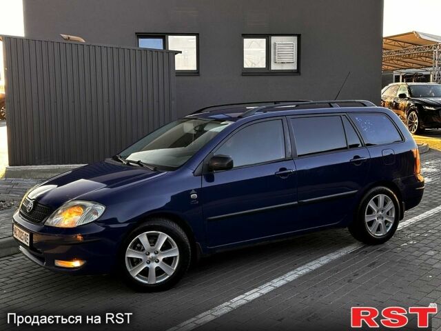 Синий Тойота Королла, объемом двигателя 2 л и пробегом 301 тыс. км за 3850 $, фото 1 на Automoto.ua