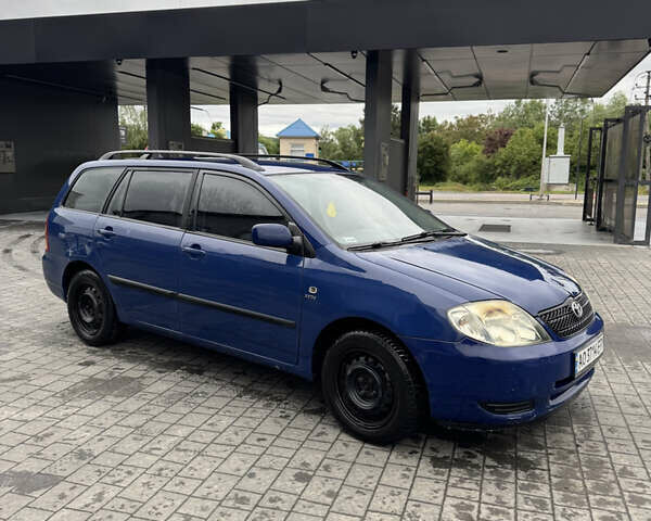 Синій Тойота Королла, об'ємом двигуна 1.4 л та пробігом 256 тис. км за 3450 $, фото 1 на Automoto.ua