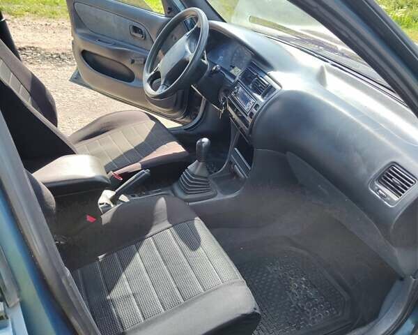 Синий Тойота Королла, объемом двигателя 2 л и пробегом 320 тыс. км за 2000 $, фото 1 на Automoto.ua