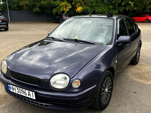 Синий Тойота Королла, объемом двигателя 1.3 л и пробегом 355 тыс. км за 2700 $, фото 1 на Automoto.ua