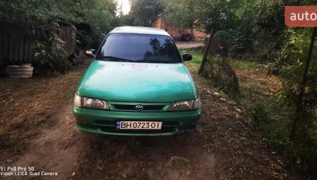 Зелений Тойота Королла, об'ємом двигуна 1.3 л та пробігом 250 тис. км за 1700 $, фото 1 на Automoto.ua