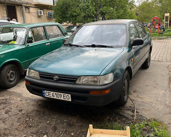 Зеленый Тойота Королла, объемом двигателя 1.3 л и пробегом 375 тыс. км за 1800 $, фото 1 на Automoto.ua