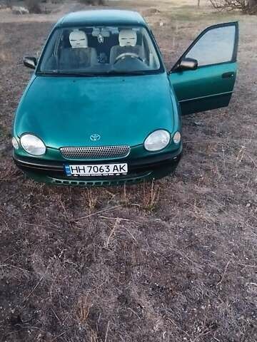 Зеленый Тойота Королла, объемом двигателя 1 л и пробегом 290 тыс. км за 2800 $, фото 1 на Automoto.ua
